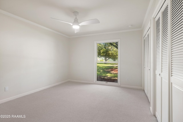201 W Eleanor St, Opelousas, LA 70570 - unfurnished bedroom featuring light colored carpet, ornamental molding, and ceiling fan