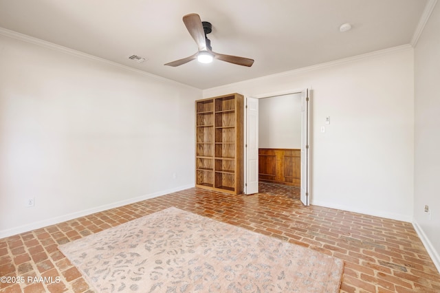 201 W Eleanor St, Opelousas, LA 70570 - unfurnished room featuring brick floors, ceiling fan, ornamental molding, and a smoke detector