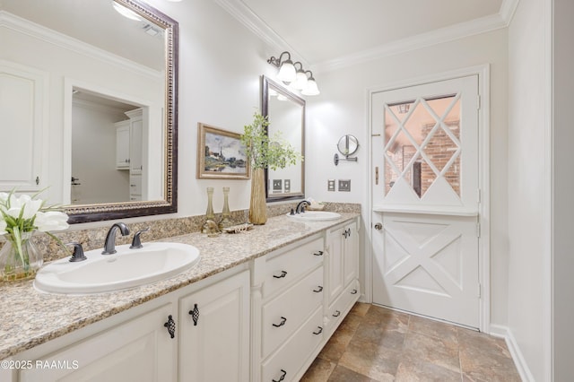 201 W Eleanor St, Opelousas, LA 70570 - full bathroom featuring double vanity, ornamental molding, and stone finish flooring