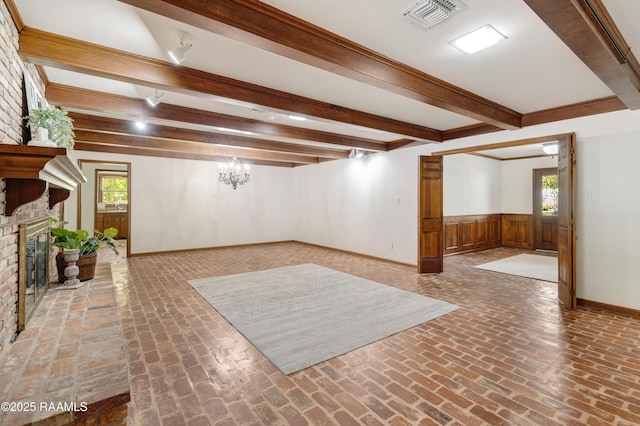 201 W Eleanor St, Opelousas, LA 70570 - below grade area featuring brick floors and a brick fireplace