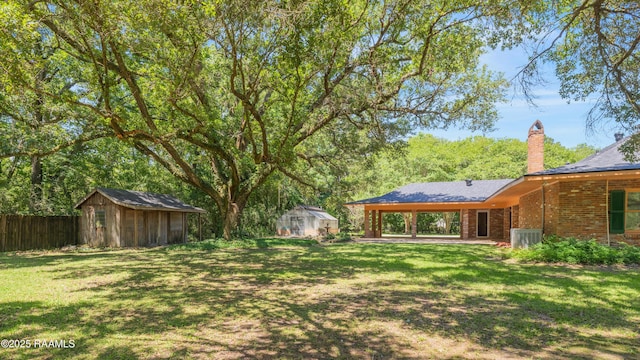 201 W Eleanor St, Opelousas, LA 70570 - view of yard with a storage unit