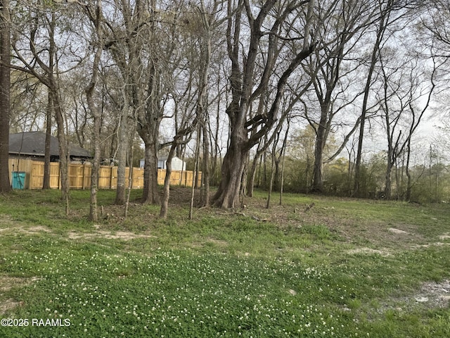 view of yard with fence