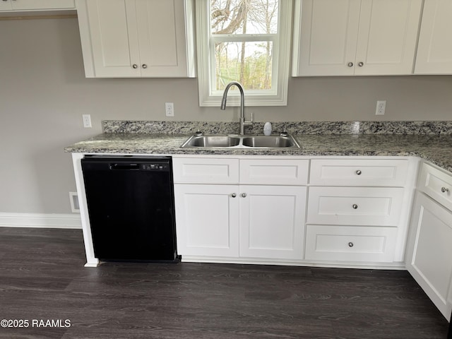 kitchen featuring a sink, white cabinetry, and dishwasher