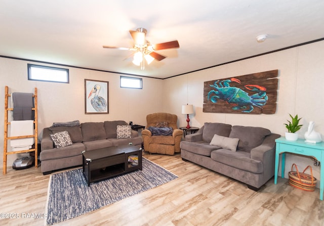 living room featuring ceiling fan and wood finished floors