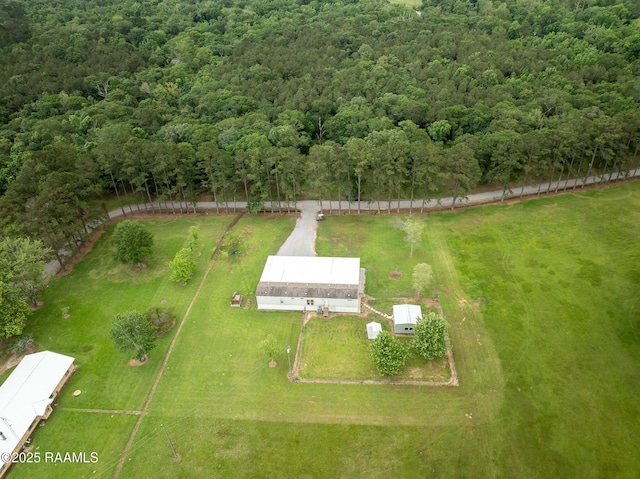 aerial view featuring a view of trees