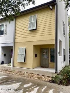 701 W Taft St Unit 7, Lafayette, LA 70503 - view of front of house with stucco siding
