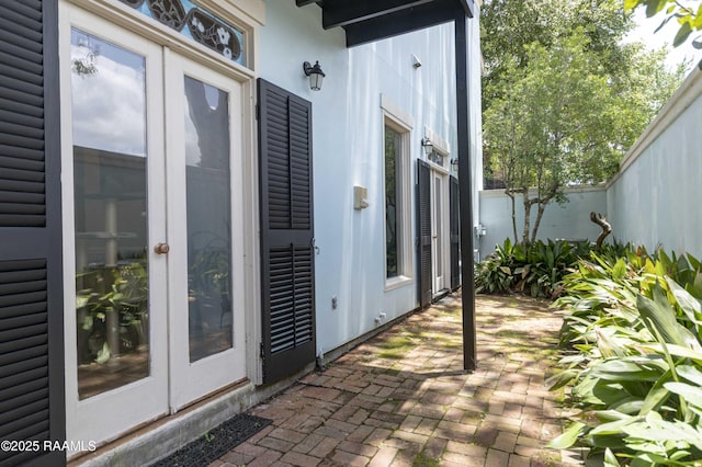 211 Ursuline St, Lafayette, LA 70506 - view of patio featuring french doors