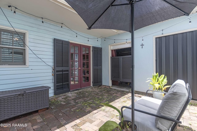 211 Ursuline St, Lafayette, LA 70506 - view of patio with french doors