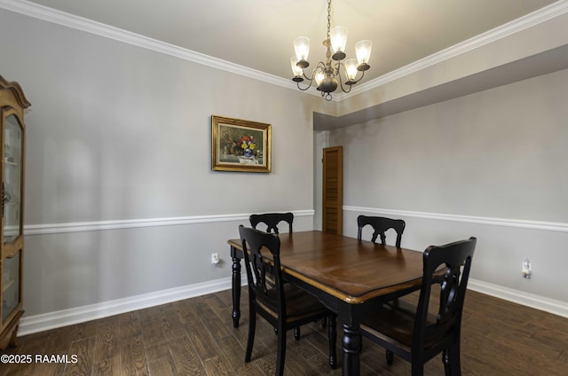 211 Ursuline St, Lafayette, LA 70506 - dining space featuring a chandelier, dark wood-style floors, and crown molding