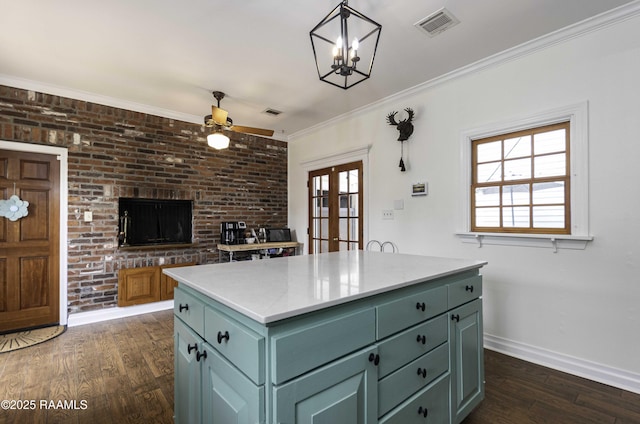 211 Ursuline St, Lafayette, LA 70506 - kitchen featuring ceiling fan, french doors, dark wood-type flooring, light countertops, and green cabinets