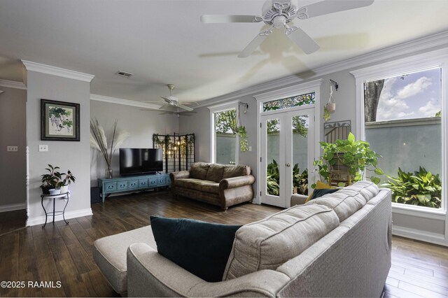 211 Ursuline St, Lafayette, LA 70506 - living room featuring french doors, plenty of natural light, a ceiling fan, and crown molding