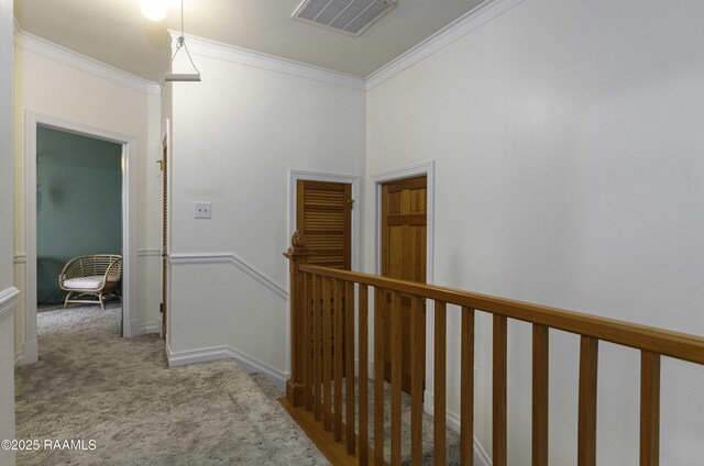 211 Ursuline St, Lafayette, LA 70506 - corridor with crown molding, an upstairs landing, and carpet floors