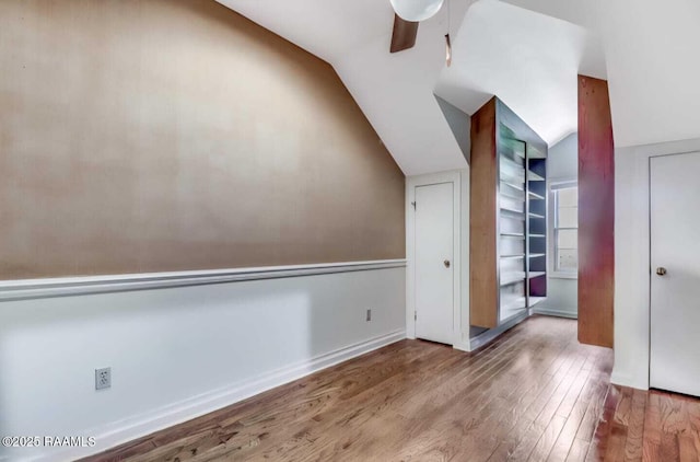 211 Ursuline St, Lafayette, LA 70506 - bonus room with lofted ceiling, wood finished floors, and ceiling fan