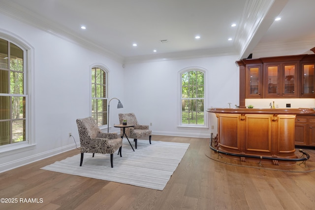 110 Interlaken Dr, New Iberia, LA 70563 - sitting room featuring light wood finished floors, crown molding, plenty of natural light, baseboards, and recessed lighting