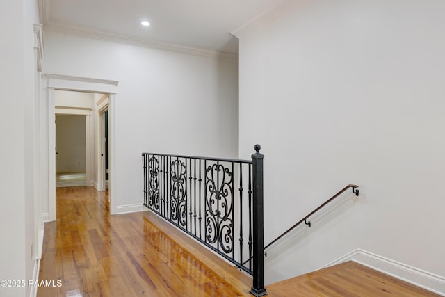110 Interlaken Dr, New Iberia, LA 70563 - staircase featuring ornamental molding, wood finished floors, and baseboards