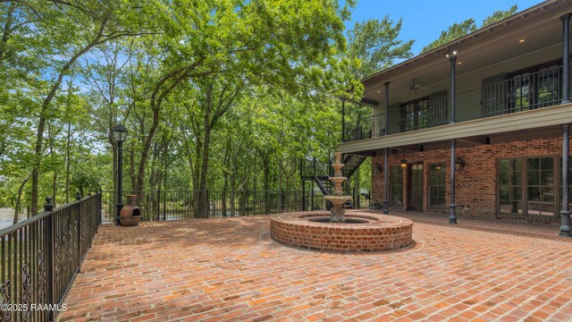 110 Interlaken Dr, New Iberia, LA 70563 - view of patio / terrace with a balcony and a ceiling fan