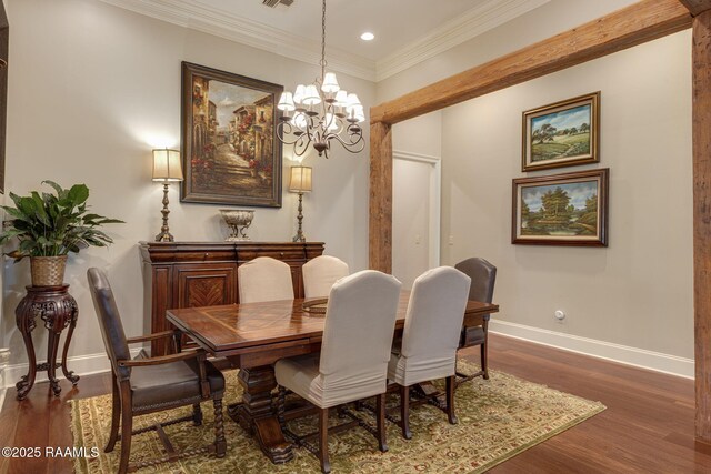 dining space with crown molding, an inviting chandelier, dark wood finished floors, recessed lighting, and baseboards