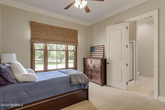 bedroom featuring crown molding, baseboards, a ceiling fan, and light colored carpet
