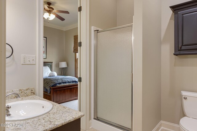 full bath featuring ensuite bathroom, ornamental molding, ceiling fan, and a shower stall