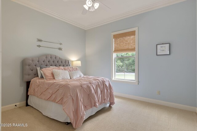 bedroom featuring a ceiling fan, baseboards, ornamental molding, and light carpet