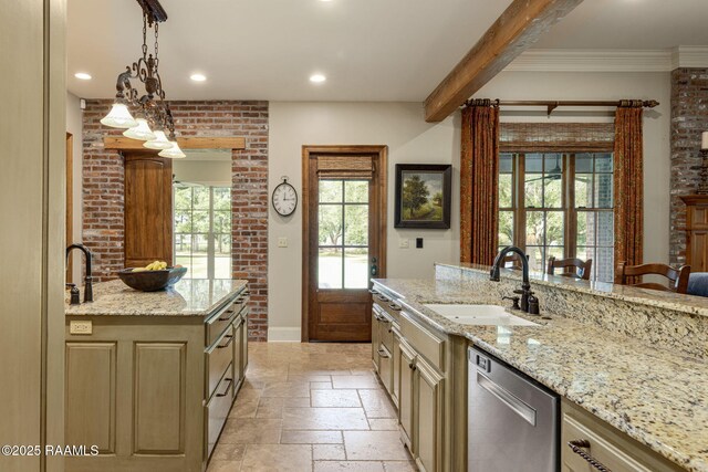 kitchen with stainless steel dishwasher, a sink, baseboards, recessed lighting, and stone tile floors