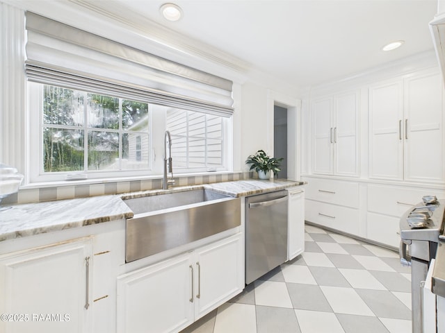 544 E Main St, New Iberia, LA 70560 - kitchen featuring stainless steel dishwasher, a sink, white cabinets, light stone countertops, and recessed lighting