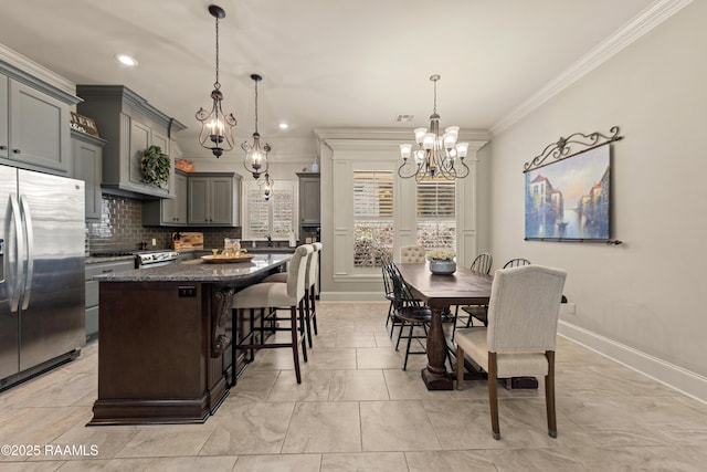 dining space with visible vents, ornamental molding, baseboards, recessed lighting, and a notable chandelier