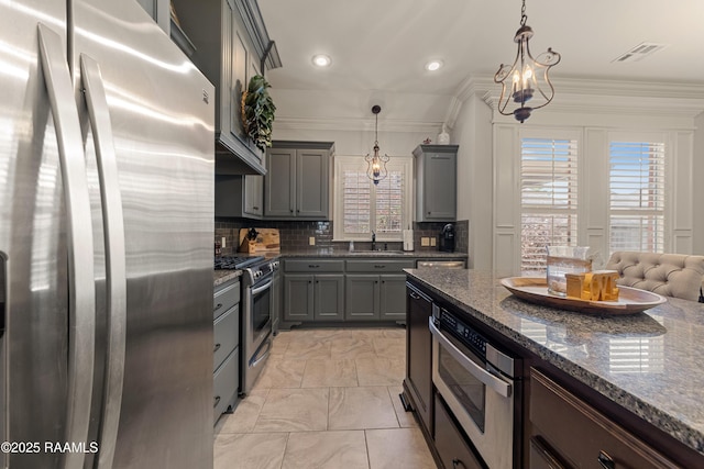 kitchen with visible vents, appliances with stainless steel finishes, a sink, gray cabinetry, and marble finish floor