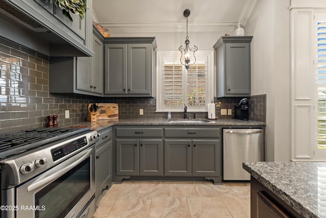 kitchen with a sink, appliances with stainless steel finishes, gray cabinets, and custom range hood