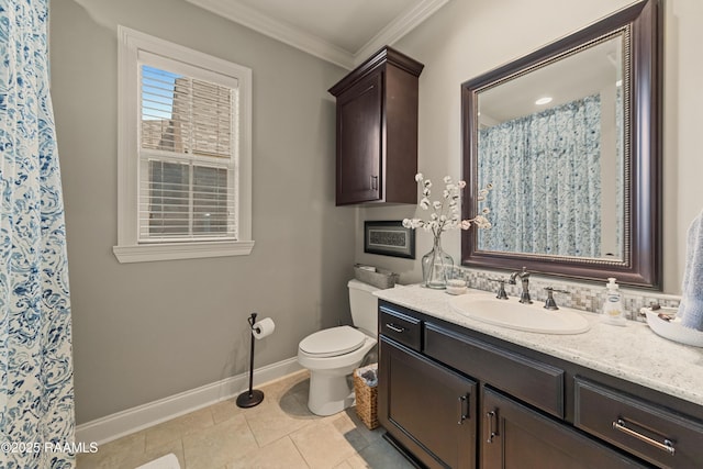 bathroom with crown molding, tile patterned flooring, vanity, toilet, and baseboards