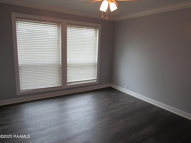 empty room with crown molding, ceiling fan, dark wood-style floors, and baseboards