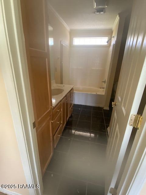 16224 Saint Elmo Rd, Erath, LA 70533 - bathroom featuring tile patterned flooring, crown molding, shower / washtub combination, and vanity