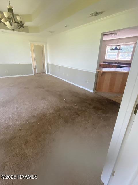 16224 Saint Elmo Rd, Erath, LA 70533 - unfurnished room featuring an inviting chandelier and baseboards