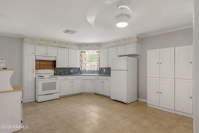 kitchen featuring visible vents, ornamental molding, white appliances, under cabinet range hood, and white cabinets