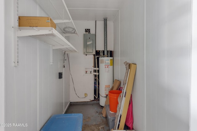 utility room featuring electric panel and gas water heater