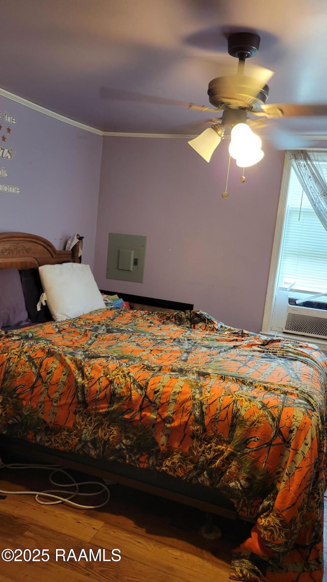 205 F St, Duson, LA 70529 - bedroom with electric panel, a ceiling fan, wood finished floors, cooling unit, and ornamental molding