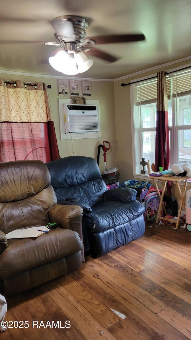 205 F St, Duson, LA 70529 - living room with ceiling fan, ornamental molding, and wood finished floors