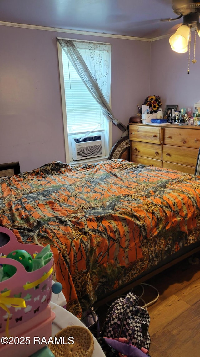 205 F St, Duson, LA 70529 - bedroom with ornamental molding, wood finished floors, and cooling unit