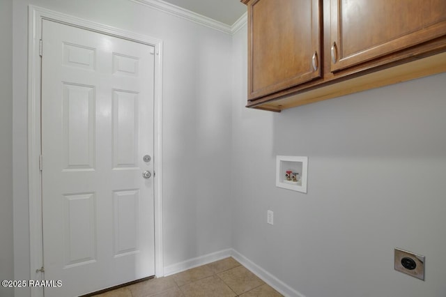 clothes washing area featuring cabinet space, washer hookup, electric dryer hookup, baseboards, and ornamental molding