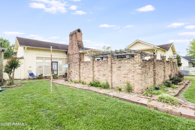 207 S Saint Valerie St, Abbeville, LA 70510 - view of yard with fence and a pergola
