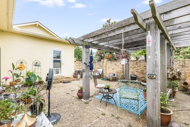 207 S Saint Valerie St, Abbeville, LA 70510 - view of patio / terrace with fence and a pergola