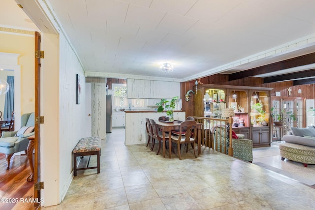 207 S Saint Valerie St, Abbeville, LA 70510 - dining space featuring wooden walls