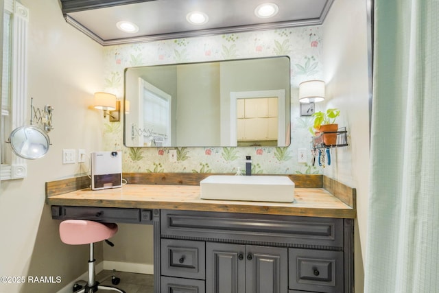 207 S Saint Valerie St, Abbeville, LA 70510 - bathroom with vanity and wallpapered walls