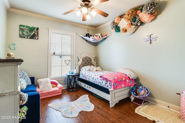 110 Beringer Dr, Duson, LA 70529 - bedroom featuring baseboards, ornamental molding, a ceiling fan, and wood finished floors