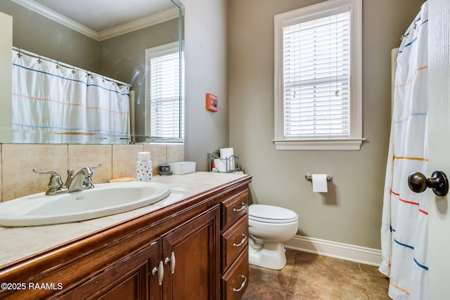 110 Beringer Dr, Duson, LA 70529 - full bath with tile patterned flooring, ornamental molding, vanity, toilet, and baseboards