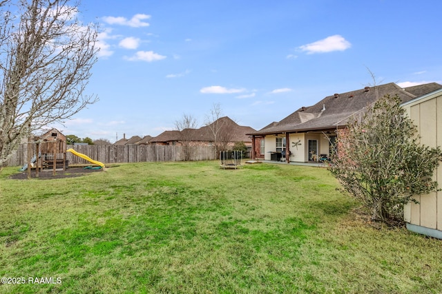 110 Beringer Dr, Duson, LA 70529 - view of yard with a playground, a patio, and a fenced backyard