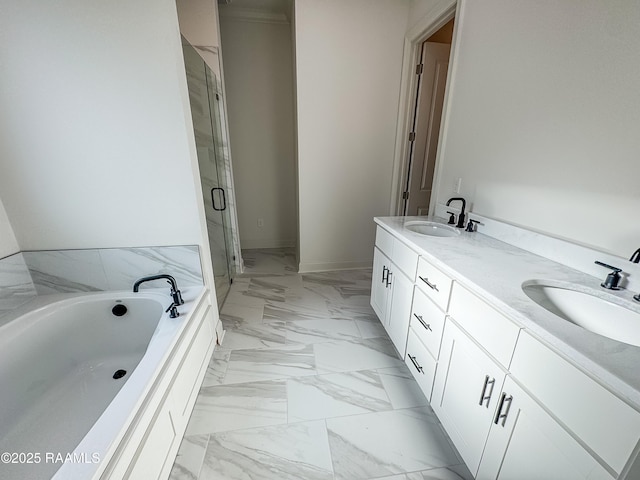 full bathroom with a sink, marble finish floor, a bath, and a shower stall