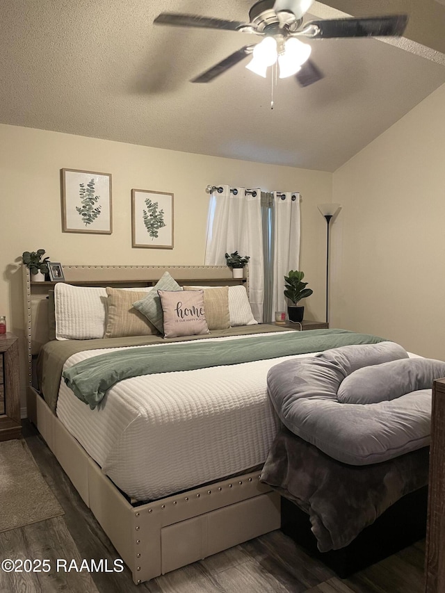 bedroom with wood finished floors and a ceiling fan