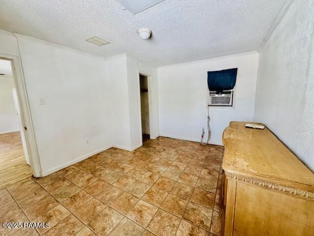 321 S Academy St, Opelousas, LA 70570 - unfurnished room with a textured ceiling and cooling unit