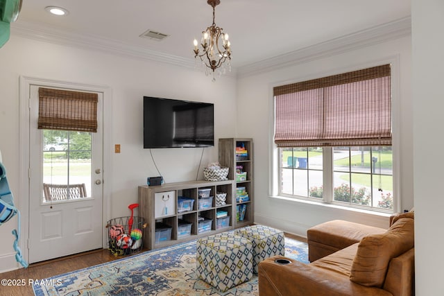 6 Oak Pl, New Iberia, LA 70563 - living area with visible vents, crown molding, wood finished floors, a chandelier, and recessed lighting
